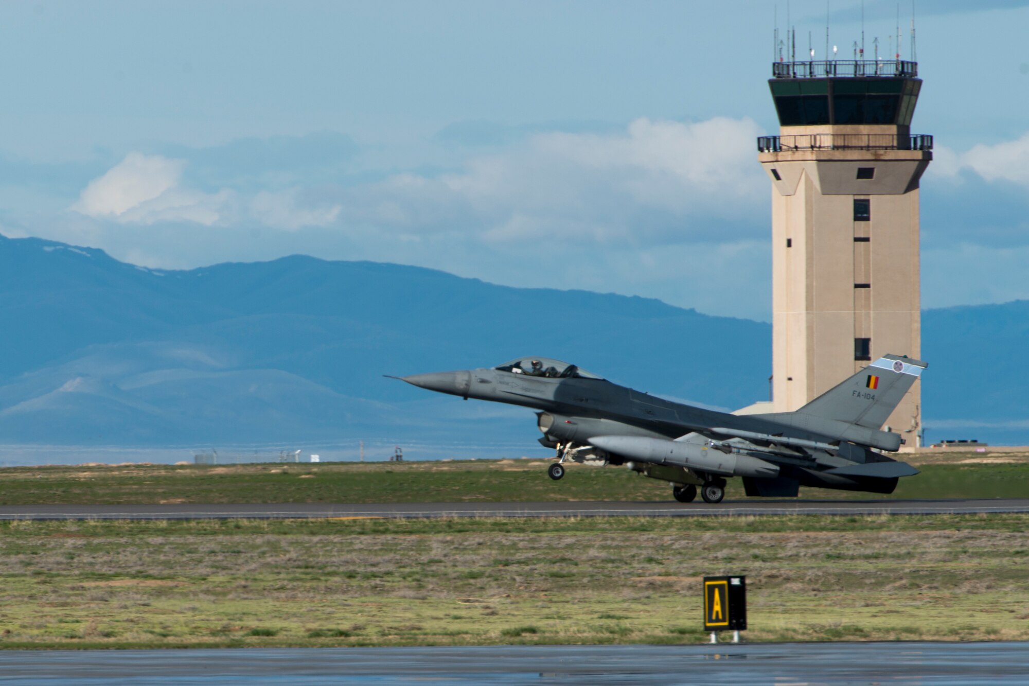 A Belgian Air Force F-16 lands on the runway during Gunfighter Flag, April 5, 2019 at Mountain Home Air Force Base, Idaho. The exercise Gunfighter Flag is held once a quarter to hone skills of 366th Fighter Wing Airmen. (U.S. Air Force photo by Airman 1st Class JaNae Capuno)