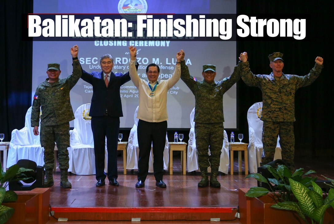 From left, Armed Forces of the Philippines Lt. Gen. Gilbert Gapay, commander, Southern Luzon Command; Sung Y. Kim, U.S. Ambassador to the Philippines; Undersecretary Cardozo M. Luna, Undersecretary of the Department of National Defense; Armed Forces of the Philippines Gen. Benjamin Madrigal, AFP chief of staff; and U.S. Marine Corps Lt. Gen. Eric M. Smith, commanding general, III Marine Expeditionary Force stand “shoulder-to-shoulder” during the Exercise Balikatan closing ceremony held at Tejeros Hall, Camp General Emilio Aguinaldo, Quezon City, Manila, Philippines, April 12, 2019. The ceremony represented the official conclusion of Balikatan 2019 and showed that the United States and the Republic of the Philippines continue to stand “shoulder-to-shoulder.” Exercise Balikatan, focused on a variety of missions, including humanitarian assistance and disaster relief, counterterrorism, and other combined military operations. (U.S. Marine Corps photo by Sgt. Trystan Jordan)