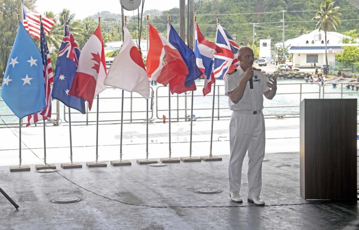 CHUUK, Federated States of Micronesia (April 13, 2019) Royal Navy Capt. Paddy Allen, director of mission, speaks during the opening ceremony aboard the Military Sealift Command expeditionary fast transport ship USNS Brunswick (T-EPF 6) during Pacific Partnership 2019. Pacific Partnership, now in its 14th iteration, is the largest annual multinational humanitarian assistance and disaster relief preparedness mission conducted in the Indo-Pacific. Each year, the mission team works collectively with host and partner nations to enhance regional interoperability and disaster response capabilities, increase stability and security in the region, and foster new and enduring friendships in the Indo-Pacific.
