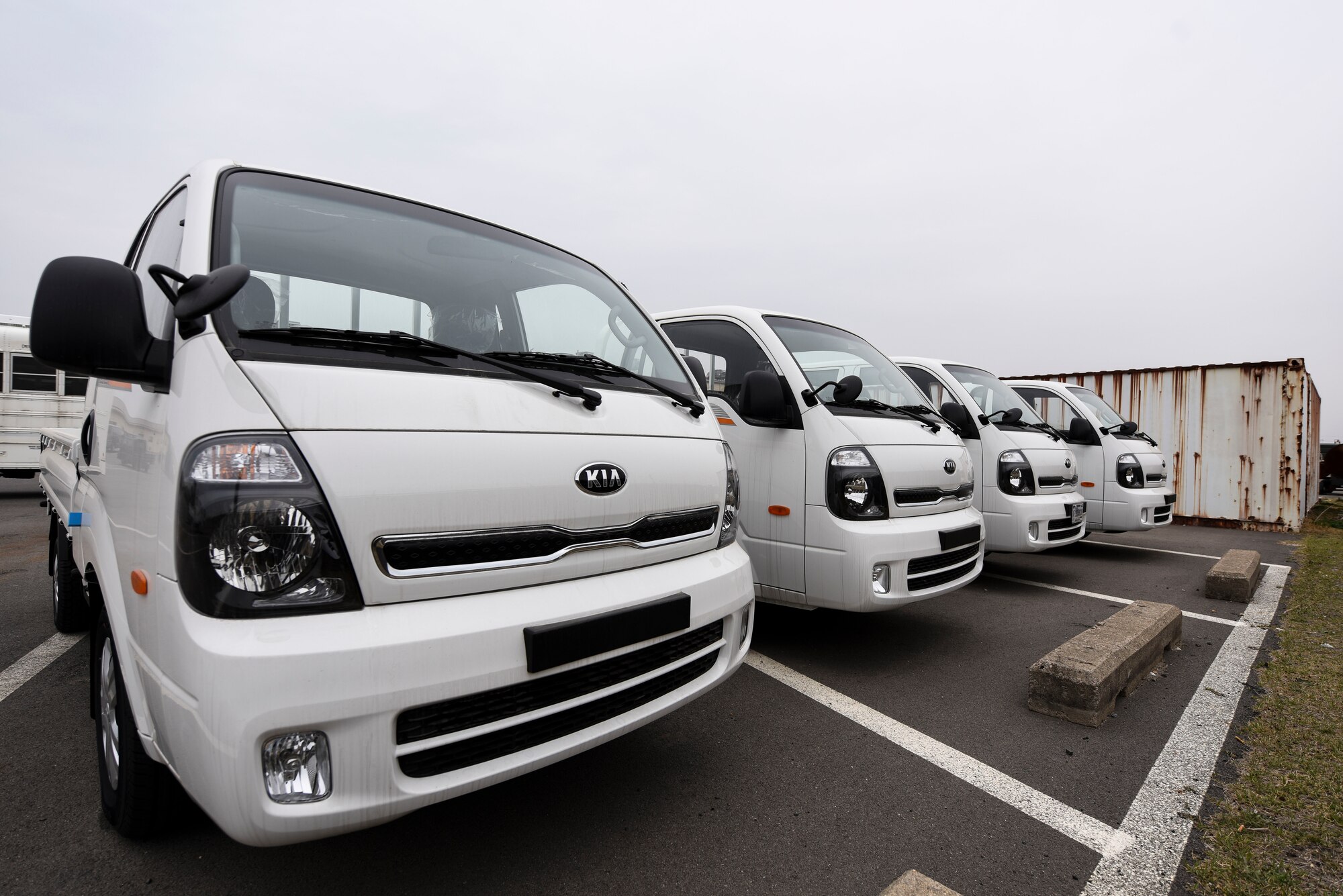 A row of new vehicles are parked on Kunsan Air Base, Republic of Korea, April 9, 2019. The 8th Logistics Readiness Squadron vehicle management team has locally procured 35 new foreign general purpose assets through the Logistics Cost Sharing (LCS) Vehicle Purchase Project, to modernize and replace part of Kunsan’s vehicle fleet. (U.S. Air Force photo by Senior Airman Savannah L. Waters)