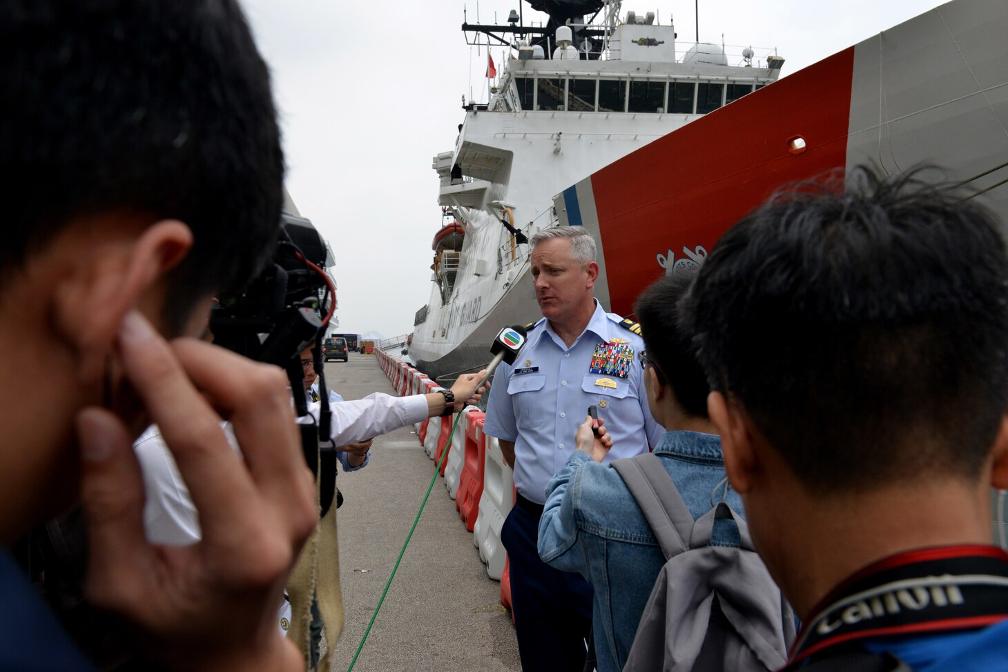 Capt. John D. Driscoll, commanding officer of the U.S. Coast Guard Cutter Bertholf (WMSL 750) speaks with members of the local and international media after the cutter moored in Hong Kong, April 15, 2019. The U.S. Coast Guard has deep and long-standing ties with our partners in the region, and more importantly, the service shares a strong commitment to a free and open Indo-Pacific, governed by a rules-based international system that promotes peace, security, prosperity, and sovereignty of all nations.