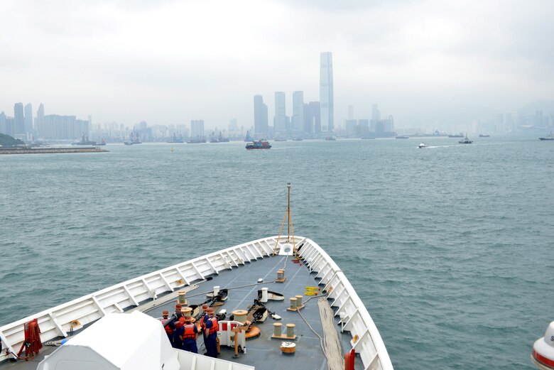 U.S. Coast Guard Cutter Bertholf (WMSL 750) crewmembers watch from the cutter’s forecastle as Bertholf navigates toward Hong Kong, April 15, 2019. The U.S. Coast Guard’s deployment of resources to the region directly supports U.S. foreign policy and national security objectives as outlined by the President in the Indo-Pacific Strategy and the National Security Strategy.
