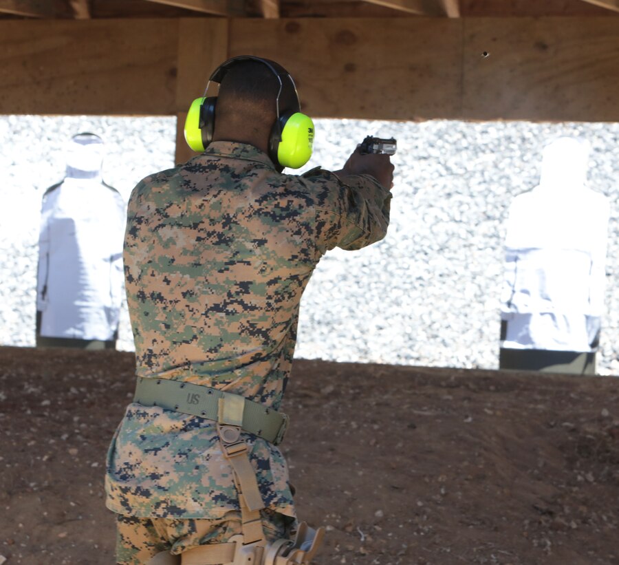 Dozens of Marines from various tenant commands aboard Marine Corps Logistics Base Albany practiced and some even qualified for the Combat Pistol Program with the Beretta M9 service pistol, March 27. Pistol qualification is required annually to sustain the skills of pistol marksmanship. In order to ensure Marines are properly trained with the weapon, the Marine Corps utilizes the Combat Pistol Program. One of the hallmarks of the CPP is how the first two stages of qualification start with the weapon in the holster, requiring the Marine to present the weapon and engage the target in one motion -- this gives the training a more combat-oriented and tactical approach. Following classroom instruction and non-fire sessions, Marines participate in live-fire drills -- training blocks one through three. During these training blocks, range coaches have the opportunity to mentor and guide Marines, which result in a more qualified, skilled and effective Marine with the service pistol. The CPP is just one of the ways the Marine Corps has made training more realistic and combat-oriented to better prepare Marines. (U.S. Marine Corps photo by Re-Essa Buckels)