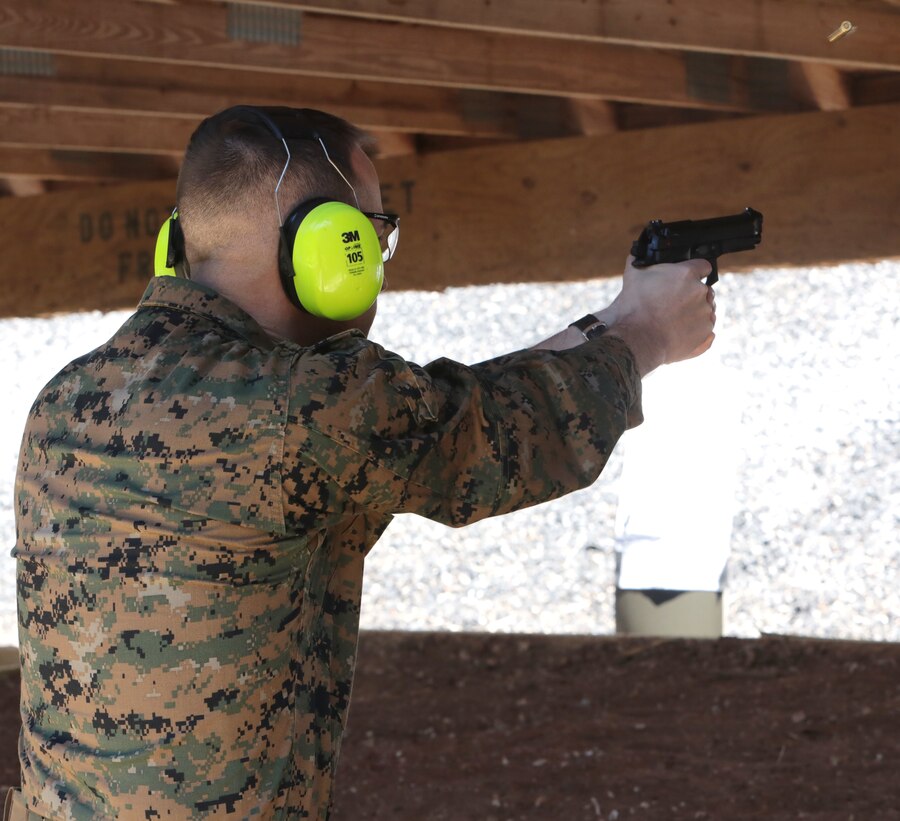 Dozens of Marines from various tenant commands aboard Marine Corps Logistics Base Albany practiced and some even qualified for the Combat Pistol Program with the Beretta M9 service pistol, March 27. Pistol qualification is required annually to sustain the skills of pistol marksmanship. In order to ensure Marines are properly trained with the weapon, the Marine Corps utilizes the Combat Pistol Program. One of the hallmarks of the CPP is how the first two stages of qualification start with the weapon in the holster, requiring the Marine to present the weapon and engage the target in one motion -- this gives the training a more combat-oriented and tactical approach. Following classroom instruction and non-fire sessions, Marines participate in live-fire drills -- training blocks one through three. During these training blocks, range coaches have the opportunity to mentor and guide Marines, which result in a more qualified, skilled and effective Marine with the service pistol. The CPP is just one of the ways the Marine Corps has made training more realistic and combat-oriented to better prepare Marines. (U.S. Marine Corps photo by Re-Essa Buckels)