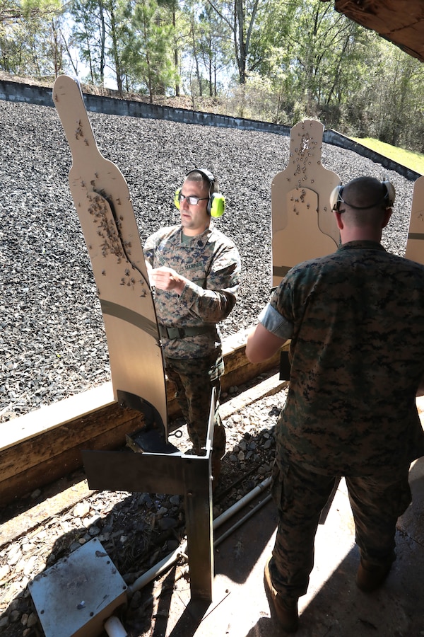 Dozens of Marines from various tenant commands aboard Marine Corps Logistics Base Albany practiced and some even qualified for the Combat Pistol Program with the Beretta M9 service pistol, March 27. Pistol qualification is required annually to sustain the skills of pistol marksmanship. In order to ensure Marines are properly trained with the weapon, the Marine Corps utilizes the Combat Pistol Program. One of the hallmarks of the CPP is how the first two stages of qualification start with the weapon in the holster, requiring the Marine to present the weapon and engage the target in one motion -- this gives the training a more combat-oriented and tactical approach. Following classroom instruction and non-fire sessions, Marines participate in live-fire drills -- training blocks one through three. During these training blocks, range coaches have the opportunity to mentor and guide Marines, which result in a more qualified, skilled and effective Marine with the service pistol. The CPP is just one of the ways the Marine Corps has made training more realistic and combat-oriented to better prepare Marines. (U.S. Marine Corps photo by Re-Essa Buckels)