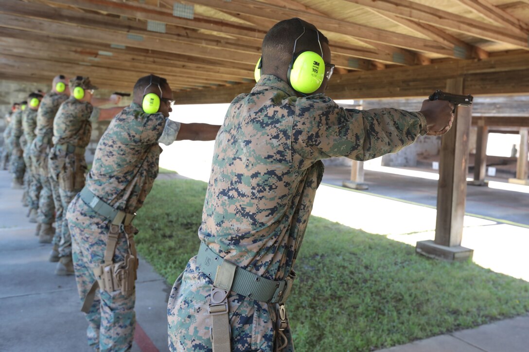 Dozens of Marines from various tenant commands aboard Marine Corps Logistics Base Albany practiced and some even qualified for the Combat Pistol Program with the Beretta M9 service pistol, March 27. Pistol qualification is required annually to sustain the skills of pistol marksmanship. In order to ensure Marines are properly trained with the weapon, the Marine Corps utilizes the Combat Pistol Program. One of the hallmarks of the CPP is how the first two stages of qualification start with the weapon in the holster, requiring the Marine to present the weapon and engage the target in one motion -- this gives the training a more combat-oriented and tactical approach. Following classroom instruction and non-fire sessions, Marines participate in live-fire drills -- training blocks one through three. During these training blocks, range coaches have the opportunity to mentor and guide Marines, which result in a more qualified, skilled and effective Marine with the service pistol. The CPP is just one of the ways the Marine Corps has made training more realistic and combat-oriented to better prepare Marines. (U.S. Marine Corps photo by Re-Essa Buckels)
