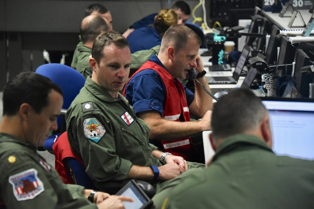 Coast Guardsmen participate in Integrated Advance 2019 exercise at the Miami-Dade County Emergency Operations Center, April 12, 2019.