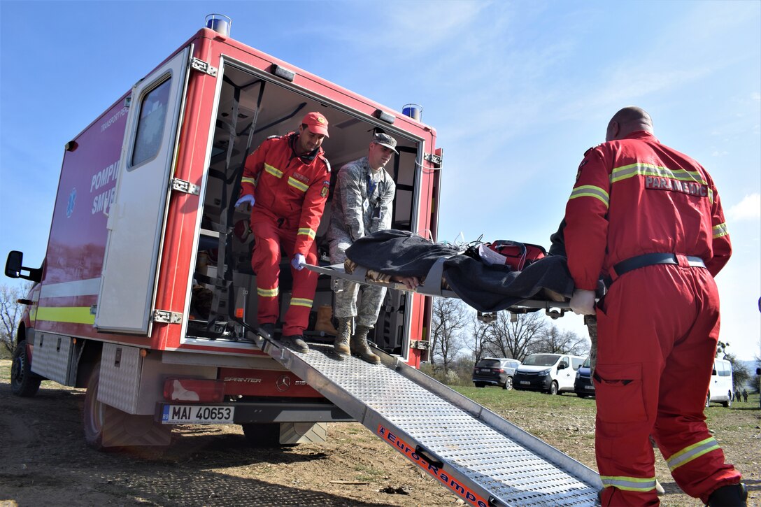 Maj. Robert Wetzler, pediatrician, 86th Medical Group, Ramstein Air Base, Germany, participates in a multinational medical exercise drill during Vigorous Warrior 19, Cincu Military Base, Romania, April 9, 2019. Vigorous Warrior 19 is NATO’s largest-ever military medical exercise, uniting more than 2,500 participants from 39 countries to exercise experimental doctrinal concepts and test their medical assets together in a dynamic, multinational environment. (U.S. Air Force photo by 1st Lt. Andrew Layton)