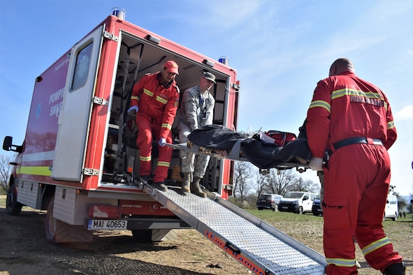 Maj. Robert Wetzler, pediatrician, 86th Medical Group, Ramstein Air Base, Germany, participates in a multinational medical exercise drill during Vigorous Warrior 19, Cincu Military Base, Romania, April 9, 2019. Vigorous Warrior 19 is NATO’s largest-ever military medical exercise, uniting more than 2,500 participants from 39 countries to exercise experimental doctrinal concepts and test their medical assets together in a dynamic, multinational environment. (U.S. Air Force photo by 1st Lt. Andrew Layton)