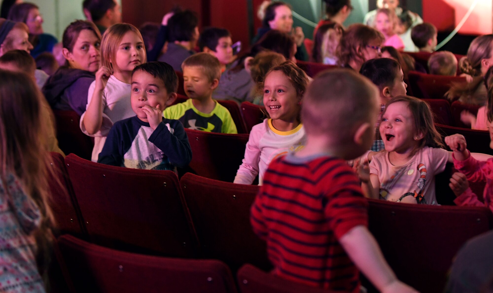 Children cheer during the finale of the Sesame Street Live performance held at the base theater on Ellsworth Air Force Base, S.D., March 28, 2019. Families were able to get up close and personal with their favorite characters while singing, dancing and learning about the importance of community. (U.S. Air Force photo by Airman 1st Class Christina Bennett)