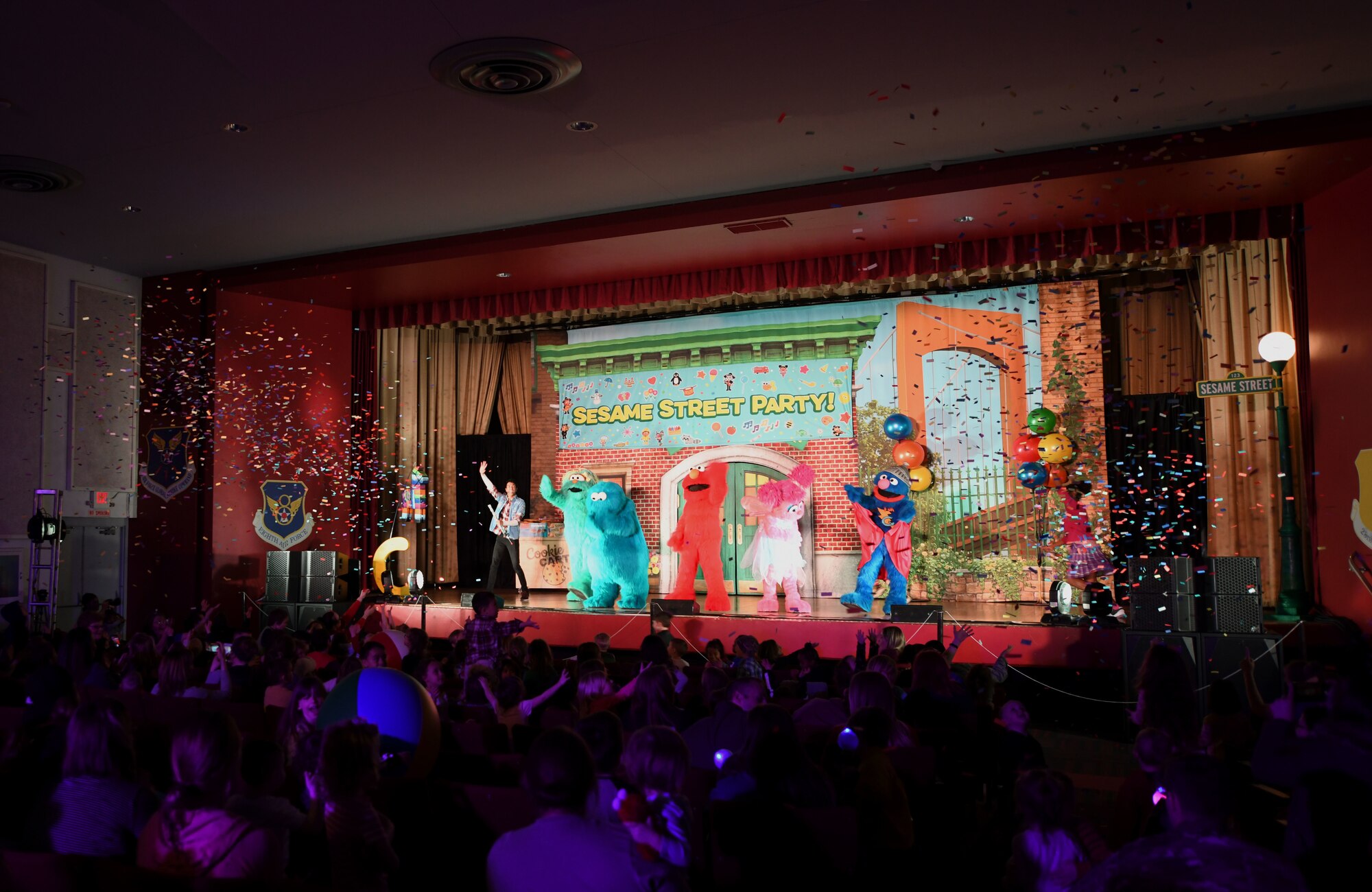 Confetti flows out to the audience during the finale of Sesame Street Live at the base theater on Ellsworth Air Force Base, S.D., March 28, 2019. Families were able to get up close and personal with their favorite characters while singing, dancing and learning about the importance of community. (U.S. Air Force photo by Airman 1st Class Christina Bennett)