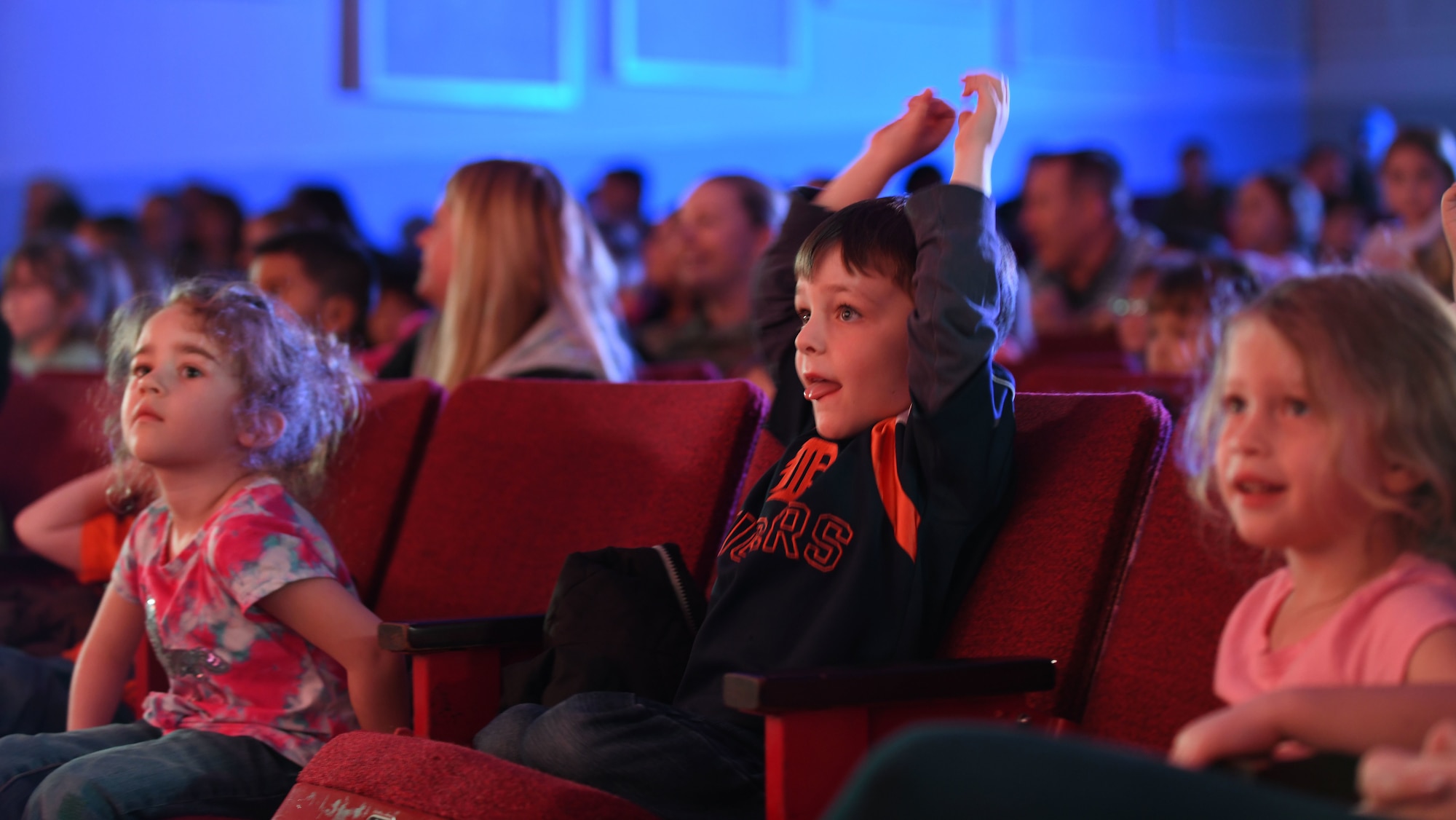 Children from the McRaven Child Development Center enjoy Sesame Street Live at the Base Theater on Ellsworth Air Force Base, S.D., March 28, 2019. Families were able to get up close and personal with their favorite characters while singing, dancing and learning about the importance of community. (U.S. Air Force photo by Airman 1st Class Christina Bennett)