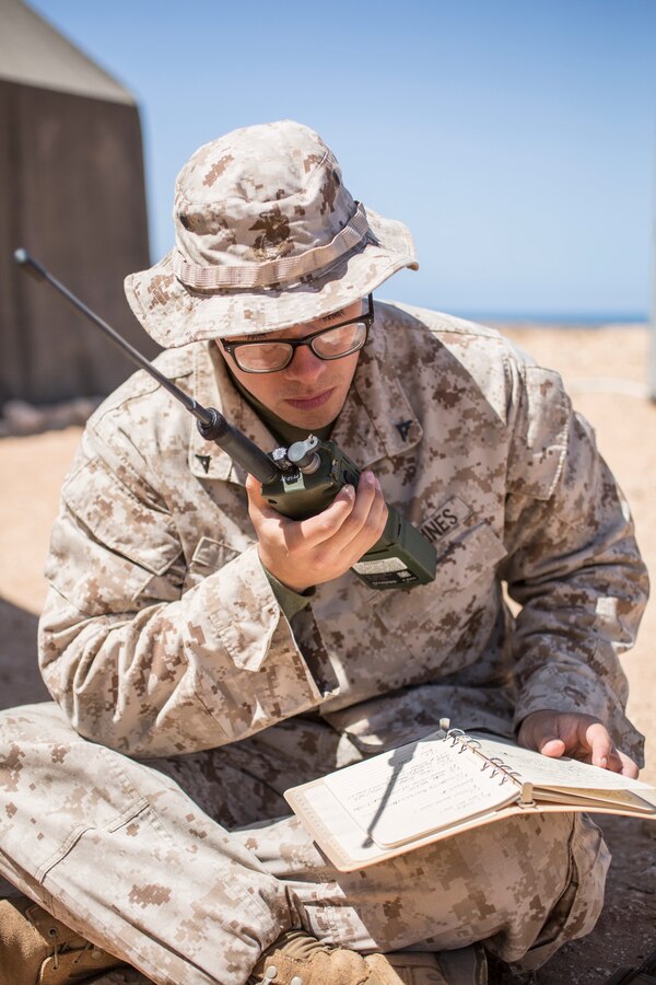 U.S. Marine Lance Cpl. Anthony Garcia, a forward observer with 4th Air Naval Gunfire Liaison Company, Force Headquarters Group, Marine Forces Reserve, practices close-air support cadence during exercise African Lion 2019 at the Aoreora range near Tan Tan, Morocco, March 27, 2019. African Lion is an annual, multinational, joint-force exercise designed to improve interoperability and mutual understanding of each nation’s tactics, techniques and procedures while demonstrating a strong partnership between nation’s militaries. (U.S. Marine Corps photo by Cpl. Tessa D. Watts)