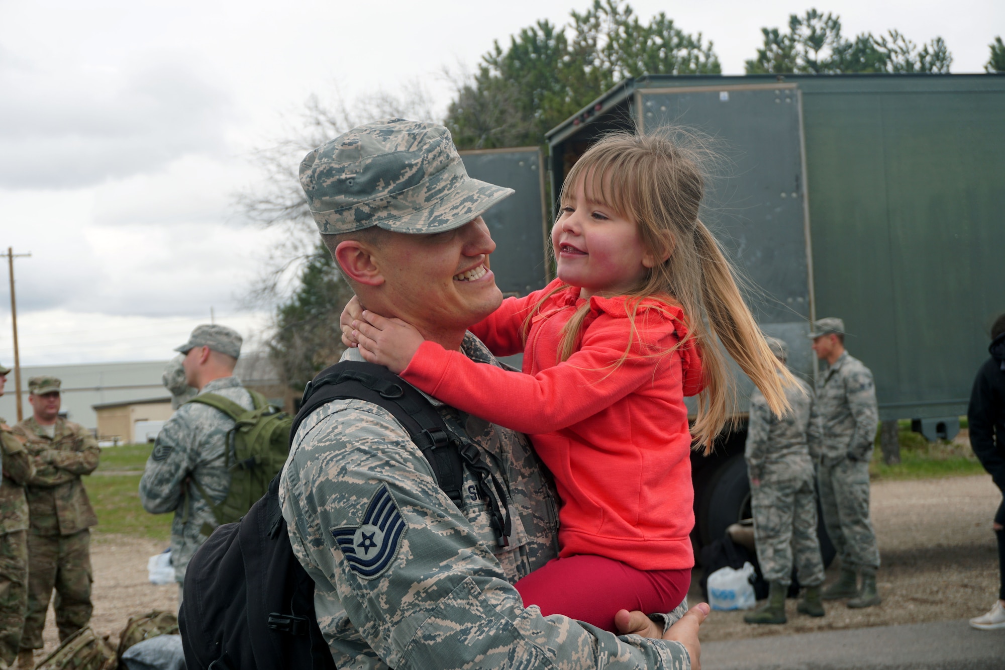 Rylan, 4, helps keep the mood light as her father, Tech. Sgt. Jeremy Smith from the 419th Aircraft Maintenance Squadron, prepares to deploy from Hill Air Force Base, Utah