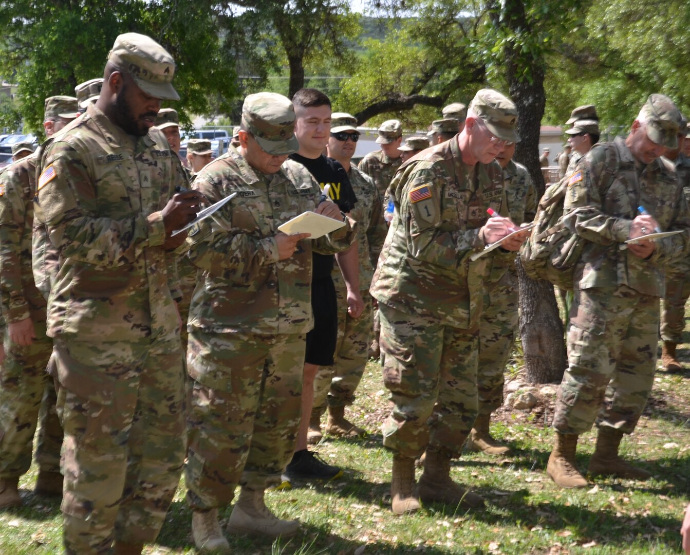 Members of the 549th Military Intelligence Battalion participate in an exercise in which they marched in place while answering questions at the same time. The exercise was one of several interactive activities service members participated in at a resiliency event on Joint Base San Antonio-Camp Bullis conducted by the Vogel Resiliency Center April 12.