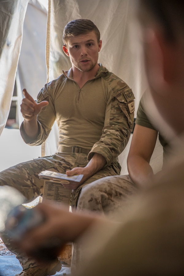 U.S. Marines with 4th Air Naval Gunfire Liaison Company listen to a class on nine-line medical evacuation procedures and calling close-air support during exercise African Lion 2019 at Greir Labouihi range, Morocco, March 27, 2019. African Lion 2019 is an annual, combined-multilateral exercise designed to improve interoperability and mutual understanding of each nation’s tactics, techniques and procedures while demonstrating a strong partnership between nation’s militaries. (U.S. Marine Corps photo by Cpl. Niles Lee)