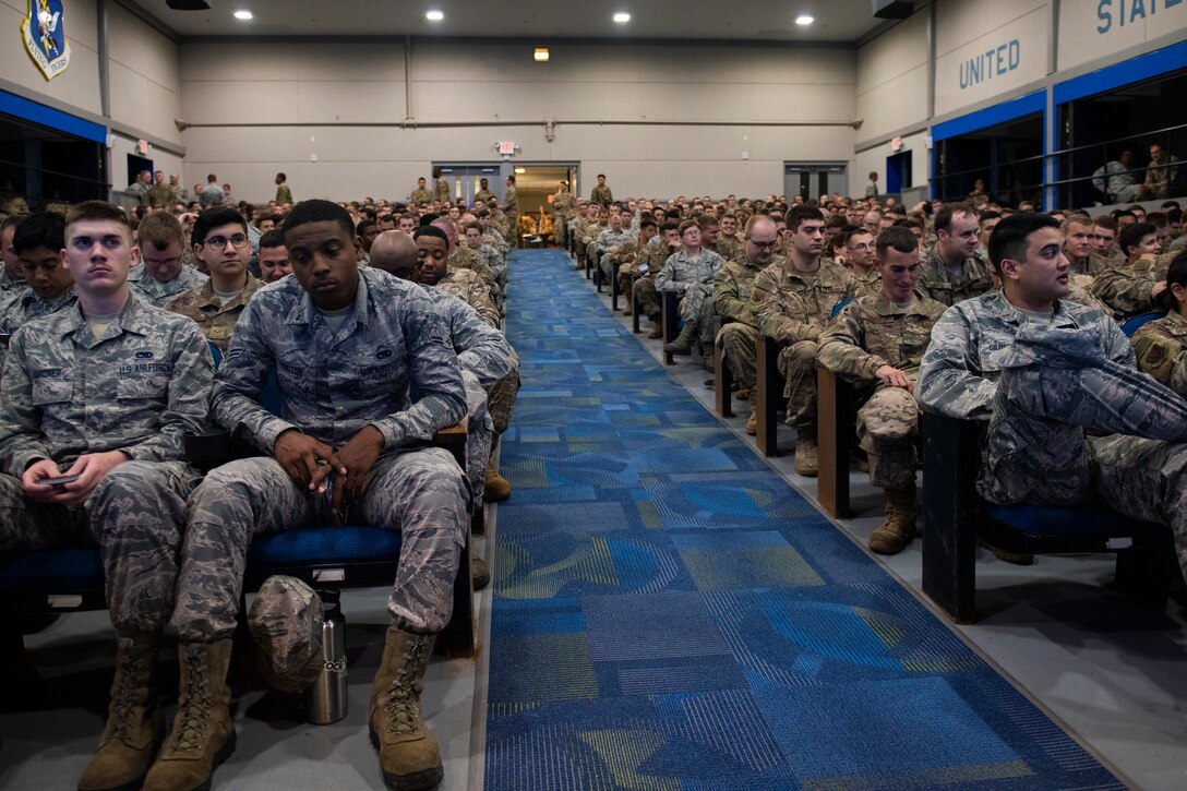 Airmen listen to a briefing for a base-wide exercise April, 2, 2019, at Moody Air Force Base, Ga.From April 15-19, 2019, Moody executed a base-wide exercise that required players to function at a high operations tempo in a chemical, biological, radioactive and nuclear environment to meet Chief of Staff of the Air Force and the Commander of Air Combat Command’s intent for readiness. (U.S. Air Force photo by Airman 1st Class Joseph P. Leveille)