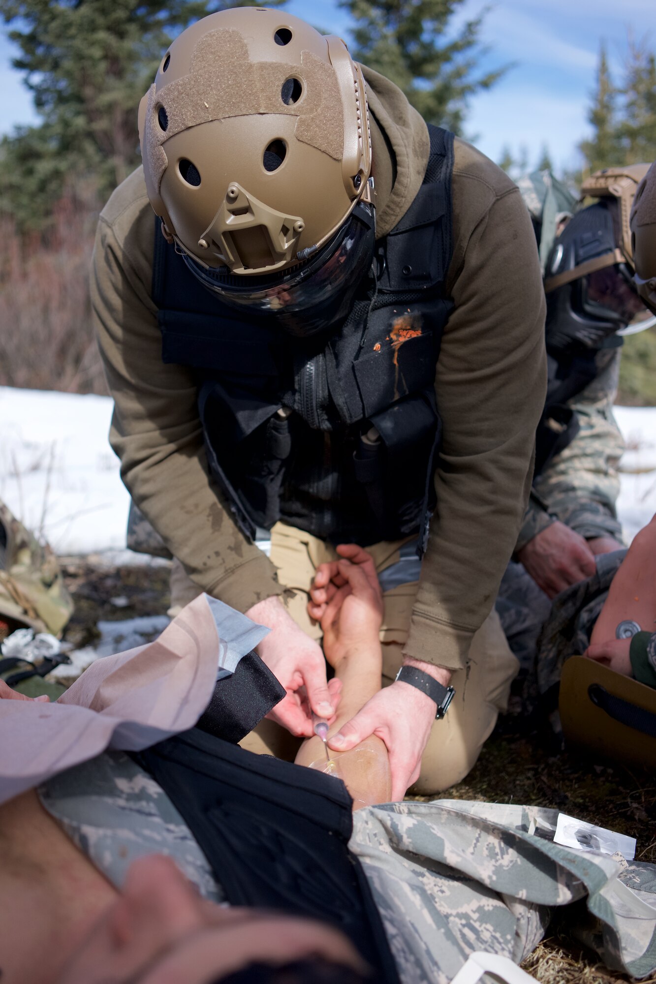 Alaska Air Guardsmen train in Tactical Combat Casualty Care .
