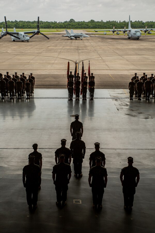 U.S. Marines with 4th Marine Aircraft Wing stand at the position of attention during the 4th MAW change of command ceremony at Naval Air Station Joint Reserve Base New Orleans, April 13, 2019. The ceremony recognized Brig. Gen. Timothy L. Adams as the 43rd commanding general of 4th MAW. 4th MAW was activated 77 years ago on Aug. 22, 1942 at Ewa, Hawaii, as the 4th Marine Base Defense Aircraft Wing. (U.S. Marine Corps photo by Lance Cpl. Jose Gonzalez)