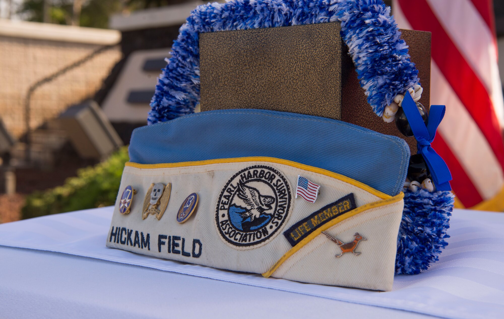 Retired Master Sgt. Byram Bates’ hat sits on display with his remains during a memorial service held for him, at the Missing Man Memorial on Joint Base Pearl Harbor-Hickam, Hawaii, April 12, 2019. Bate’s remains were turned over to Jessie Higa, a Hickam Field historian, by a family friend in Nov. 2018 as part of Bate’s final wishes to be returned to Hawaii. (U.S. Air Force photo by Tech. Sgt. Heather Redman)