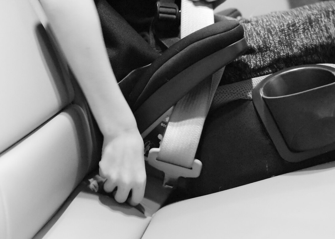 Reagan unbuckles his seatbelt to go into school, April 8, 2019, in Cheyenne, Wyo. Reagan is the son of a military mom, and April is the Month of the Military child, where we take time to honor the difficulties children of military families’ faces. (U.S. Air Force photo by Airman 1st Class Braydon Williams)