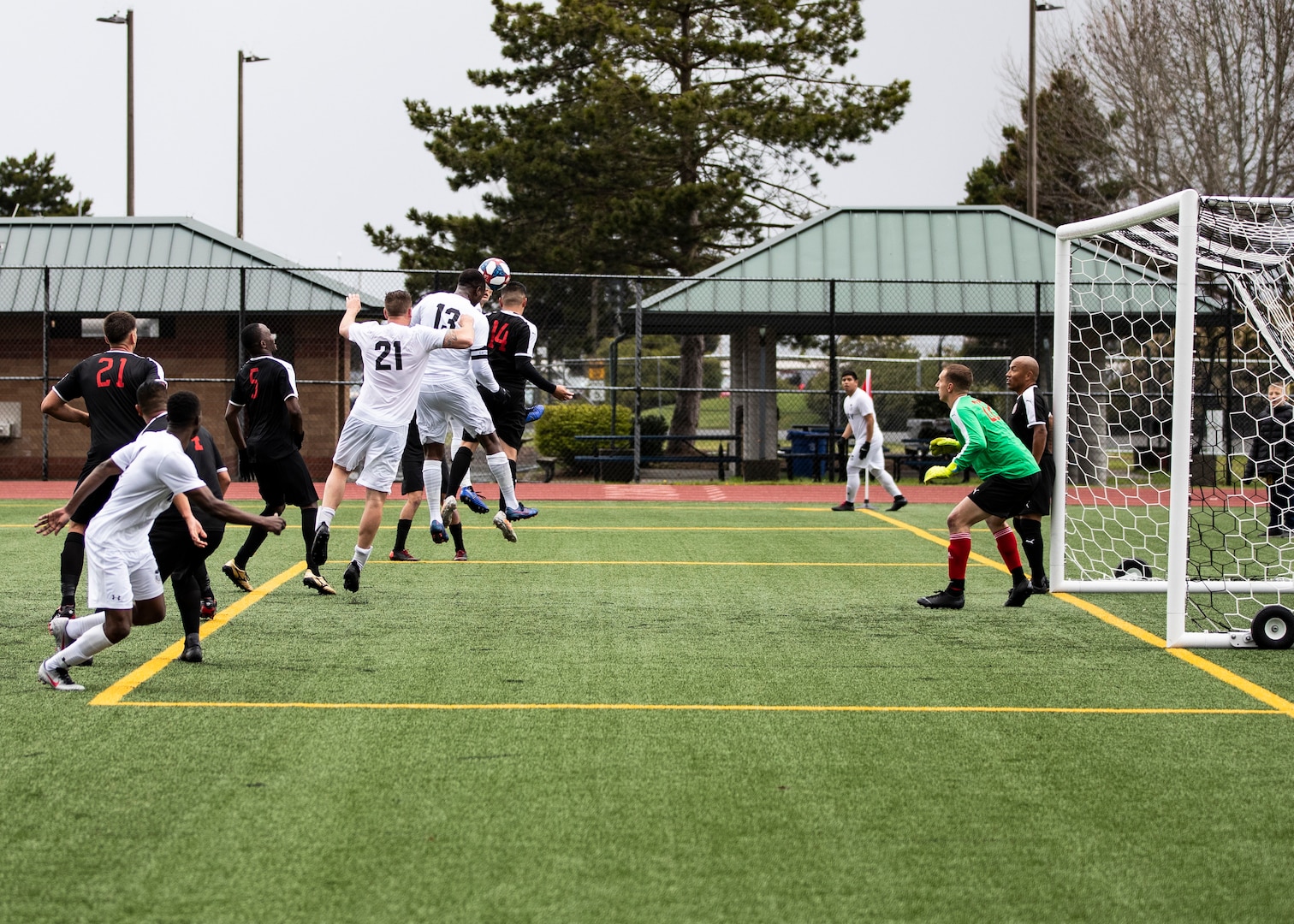 NAVAL STATION EVERETT, Wa. (April 14, 2019) - Navy soccer team’s Petty Officer 1st Class Damion Brown, stationed at Eglin Air Force Base, Fl., knocks in the header to score a goal against the Marine Corp. team during the opening match of the Armed Forces Sports Men’s Soccer Championship hosted at Naval Station Everett. (U.S. Navy Photo by Mass Communication Specialist 2nd Class Ian Carver/RELEASED). 190414-N-XK513-0744