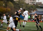 NAVAL STATION EVERETT, Wa. (April 14, 2019) - Players from the Army and Navy soccer teams compete in the opening match of the Armed Forces Sports Men’s Soccer Championship hosted at Naval Station Everett. (U.S. Navy Photo by Mass Communication Specialist 2nd Class Ian Carver/RELEASED). 190414-N-XK513-1438