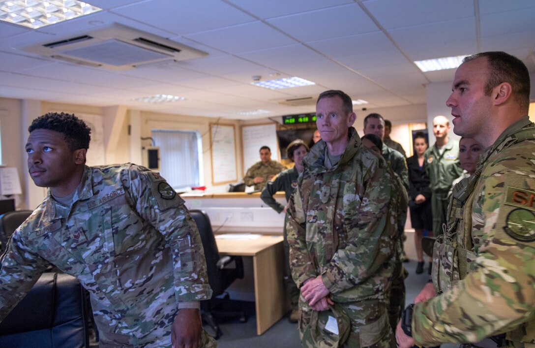 Staff Sgt. Justin Caldwell, 2nd Security Forces Squadron base defense operations controller (left) and 1st Lt. Adam Sacchetti, Bomber Task Force security forces commander (right) both deployed from Barksdale Air Force Base, La., brief Maj. Gen. James Dawkins Jr., Eighth Air Force and Joint-Global Strike Operations Center commander at RAF Fairford, England, April 4, 2019. During Dawkins’ visit with the defenders, he was briefed about the security forces operations during the U.S. Strategic Command Bomber Task Force in Europe and how they worked with the local police to support the mission. (U.S. Air Force photo by Airman 1st Class Tessa B. Corrick)