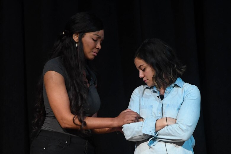Members of the Pure Praxis Sexual Assault Theater Group perform a scene during a Sexual Assault Prevention show at Joint Base Langley-Eustis, Virginia, April 12, 2019.