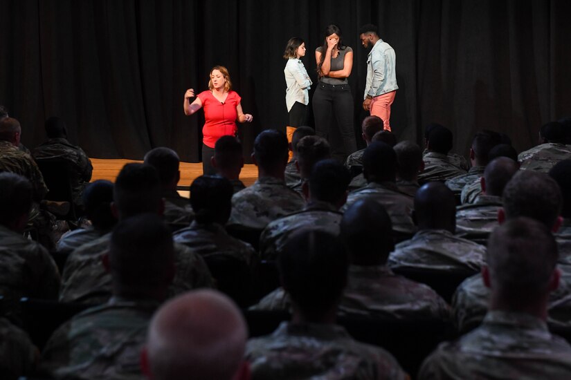 U.S. Army Soldiers watch a Pure Praxis Sexual Assault Theater Group performance at Joint Base Langley-Eustis, Virginia, April 12, 2019.