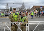 Spc. Daniel Dellisola and Pvt. Haley MacDonald, 747th Military Police Company Soldiers, support state and local law enforcement during the 123rd Boston Marathon April 15, 2019, in Hopkinton, Massachusetts. More than 500 members of the Massachusetts National Guard provided support during the marathon.