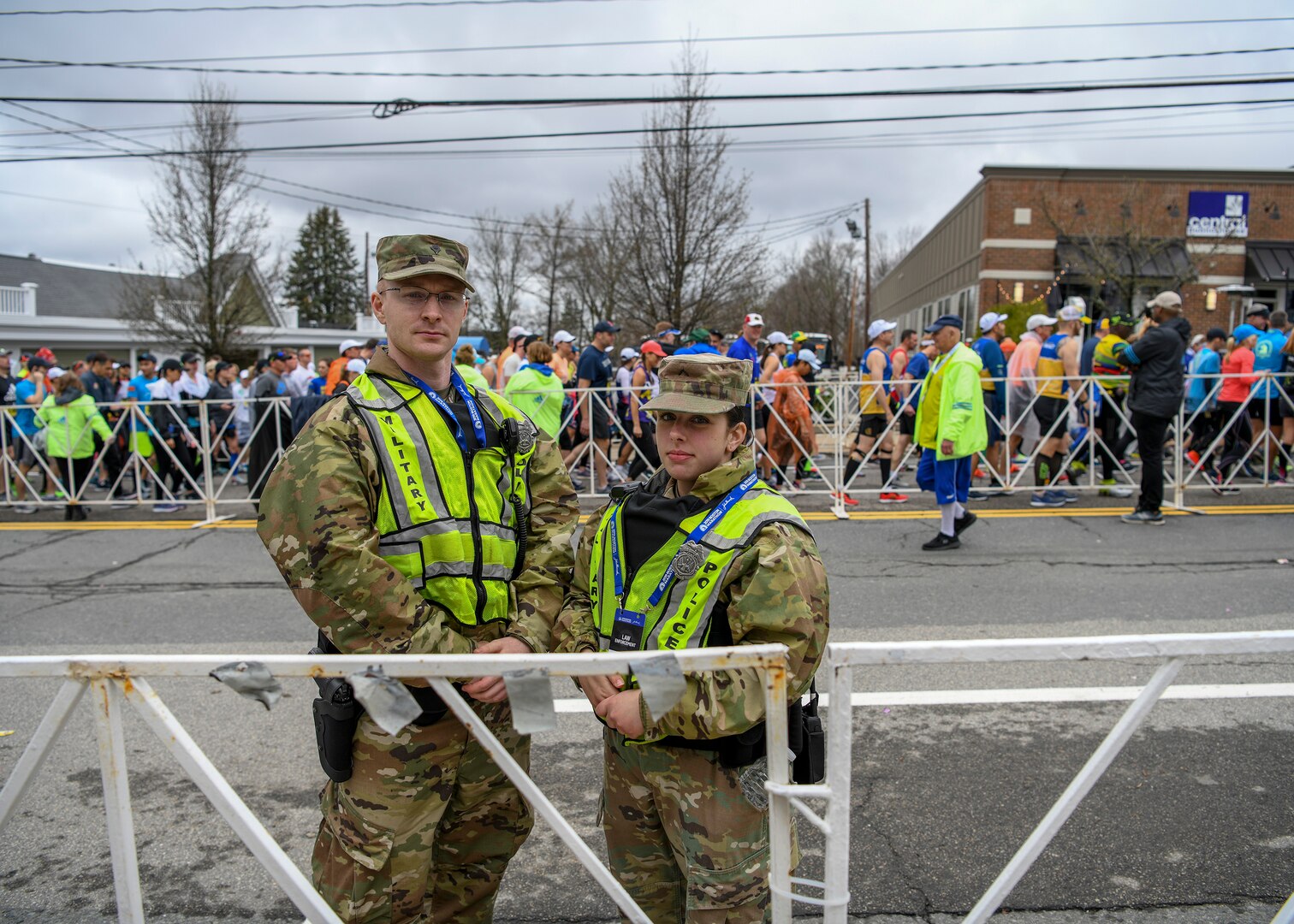 Spc. Daniel Dellisola and Pvt. Haley MacDonald, 747th Military Police Company Soldiers, support state and local law enforcement during the 123rd Boston Marathon April 15, 2019, in Hopkinton, Massachusetts. More than 500 members of the Massachusetts National Guard provided support during the marathon.
