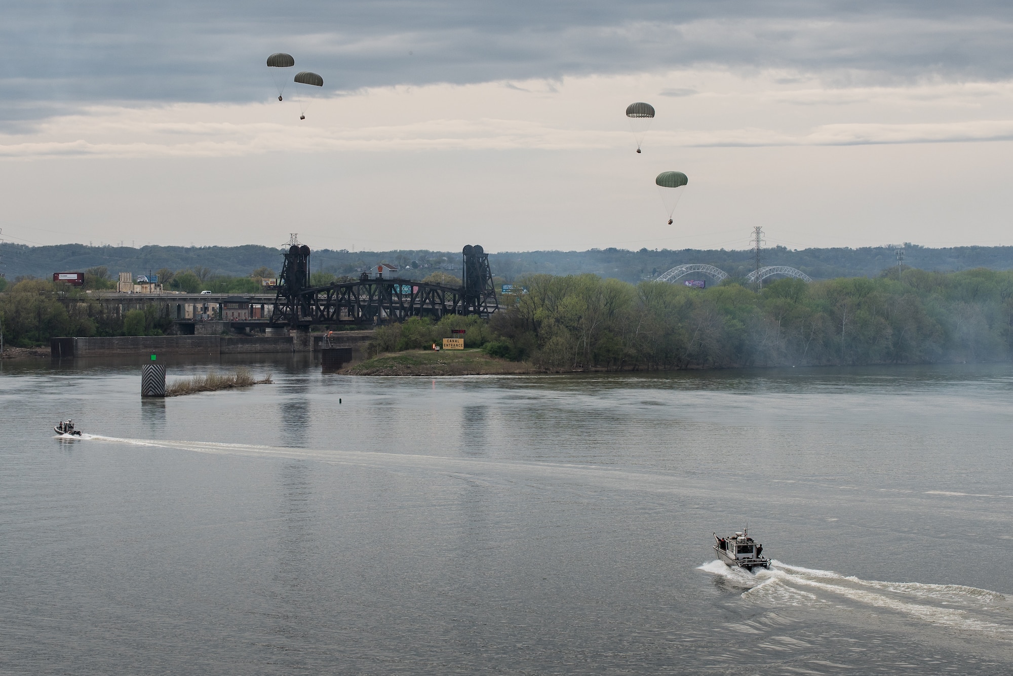 Recovery teams from the Kentucky Air National Guard prepare to retrieve cargo bundles from the Ohio River after an air-drop demonstration as part of the Thunder Over Louisville airshow in Louisville, Ky., April 13, 2019. Hundreds of thousands of spectators turned out to view the annual event, which has grown to become one of the largest single-day air shows in North America. (U.S. Air National Guard photo by Dale Greer)