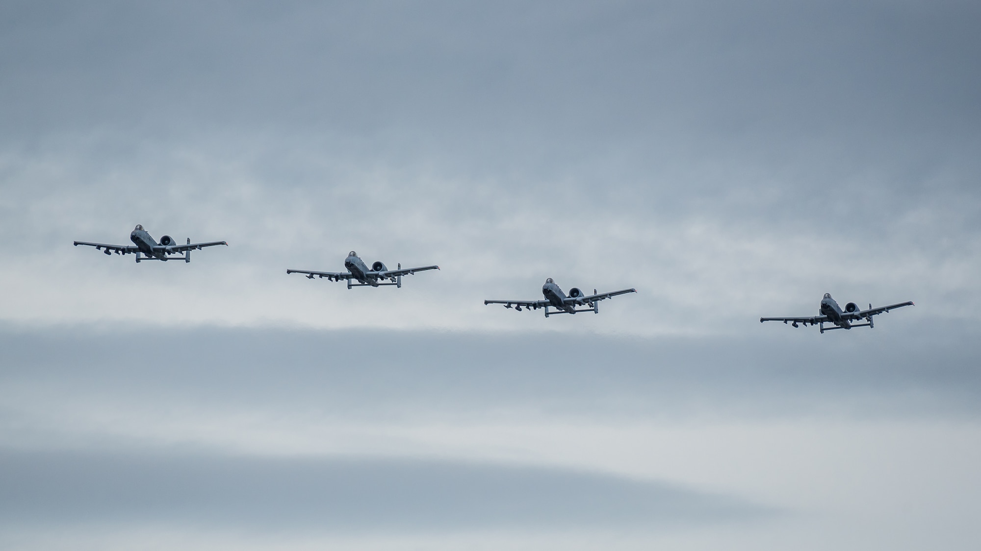 A team of U.S. Air Force A-10 Thunderbolt II aircraft approach the show box over the Ohio River during the Thunder Over Louisville airshow in Louisville, Ky., April 13, 2019. The Kentucky Air National Guard once again served as the base of operations for military aircraft participating in the annual event, which has grown to become one of the largest single-day air shows in North America. (U.S. Air National Guard photo by Dale Greer)