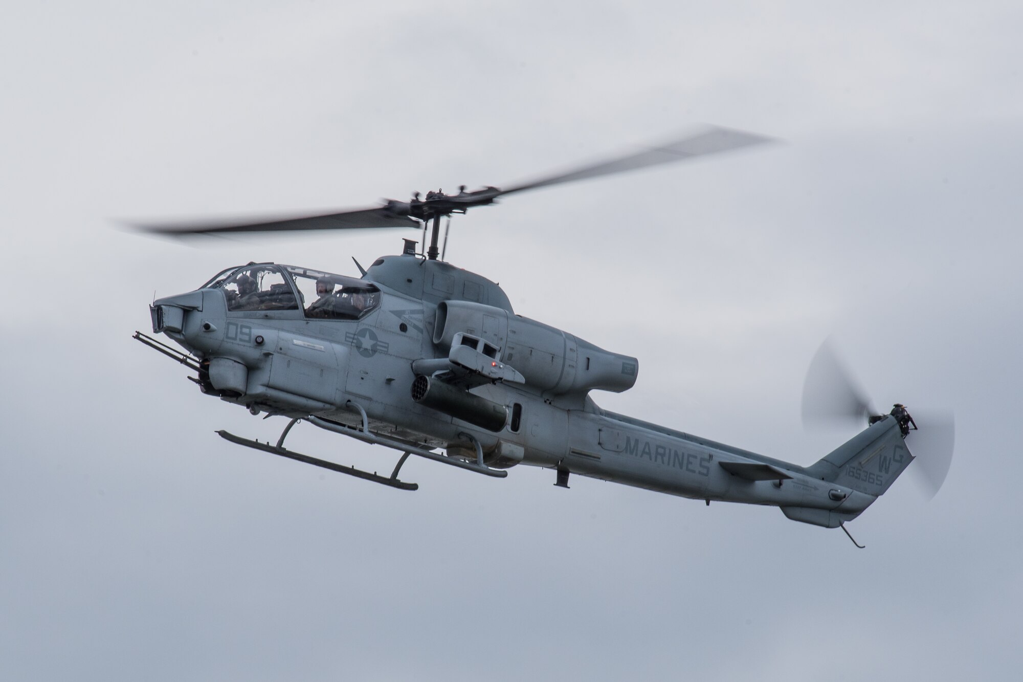 An AH-1W Super Cobra from the U.S. Marine Corps Light Attack Helicopter Squadron 773 at Joint Base McGuire-Dix-Lakehurst, N.J., performs an aerial demonstration during the Thunder Over Louisville airshow in Louisville, Ky., April 13, 2019. The Kentucky Air National Guard once again served as the base of operations for military aircraft participating in the annual event, which has grown to become one of the largest single-day air shows in North America. (U.S. Air National Guard photo by Dale Greer)