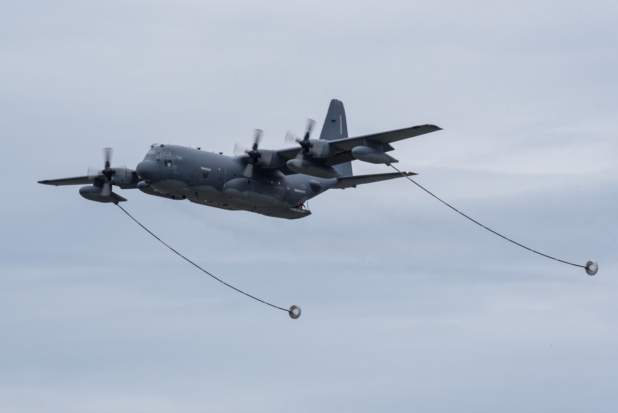 A U.S. Air Force HC-130 Hercules aircraft from Patrick Air Force Base Florida, deploys its refueling drogues over the Ohio River during the Thunder Over Louisville airshow in Louisville, Ky., April 13, 2019. The Kentucky Air National Guard once again served as the base of operations for military aircraft participating in the annual event, which has grown to become one of the largest single-day air shows in North America. (U.S. Air National Guard photo by Dale Greer)