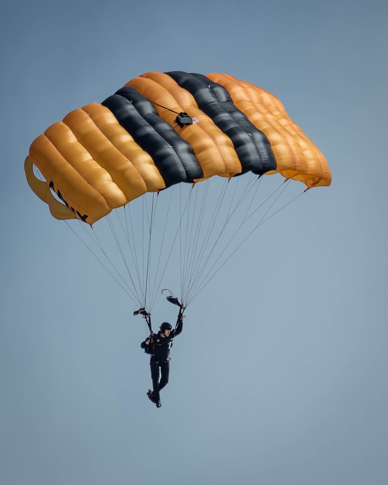 A soldier from the U.S. Army’s Golden Knights parachute demonstration team descends into downtown Louisville April 13, 2019, during the annual Thunder Over Louisville air show. Hundreds of thousands of spectators turned out to view the event, which has grown to become one of the largest single-day air shows in North America. (U.S. Air National Guard photo by Dale Greer)