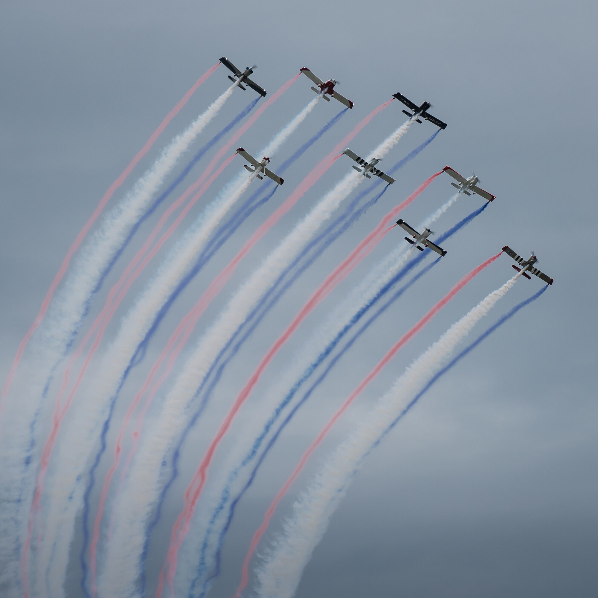 RV-4 pilots with the KC Flight Team perform an aerial demonstration during the Thunder Over Louisville airshow in Louisville, Ky., April 13, 2019. The Kentucky Air National Guard once again served as the base of operations for military aircraft participating in the annual event, which has grown to become one of the largest single-day air shows in North America. (U.S. Air National Guard photo by Dale Greer)