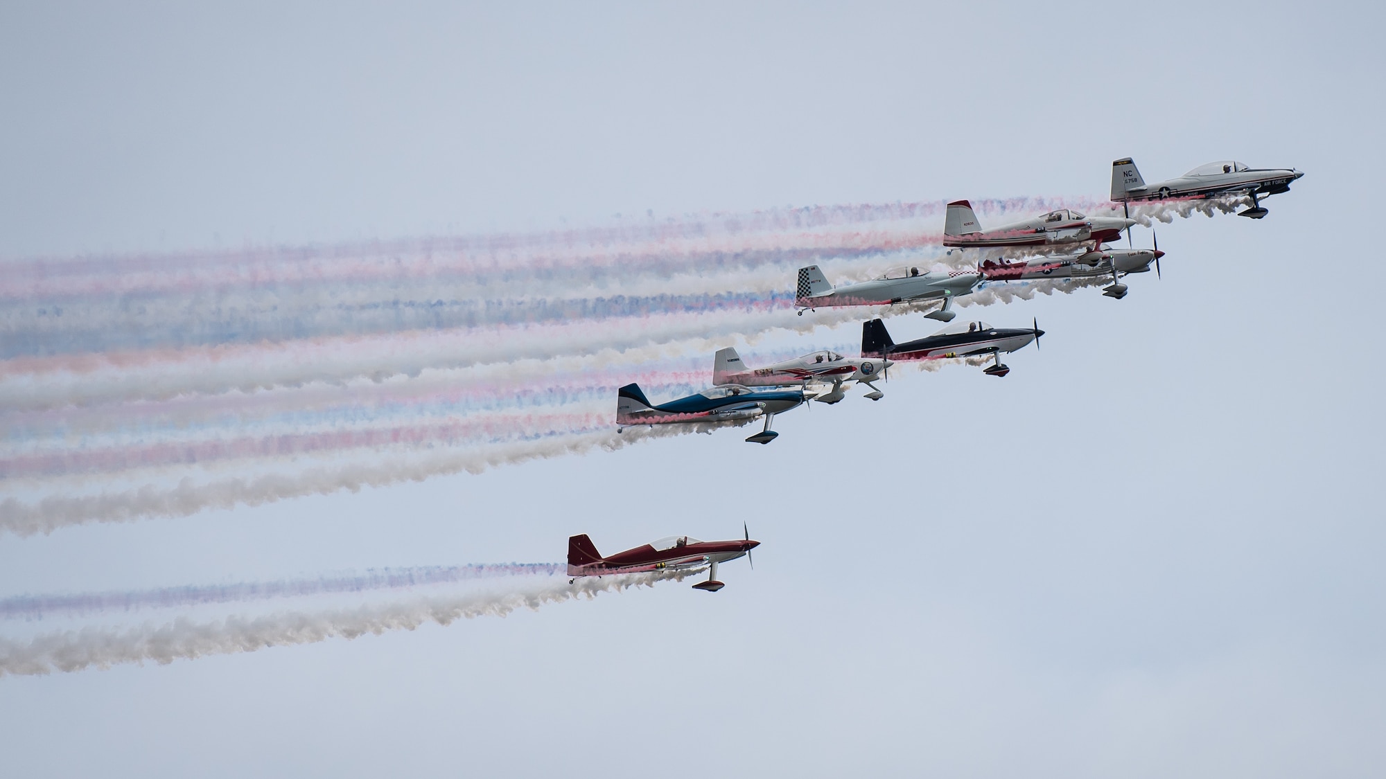 RV-4 pilots with the KC Flight Team perform an aerial demonstration during the Thunder Over Louisville airshow in Louisville, Ky., April 13, 2019. The Kentucky Air National Guard once again served as the base of operations for military aircraft participating in the annual event, which has grown to become one of the largest single-day air shows in North America. (U.S. Air National Guard photo by Dale Greer)