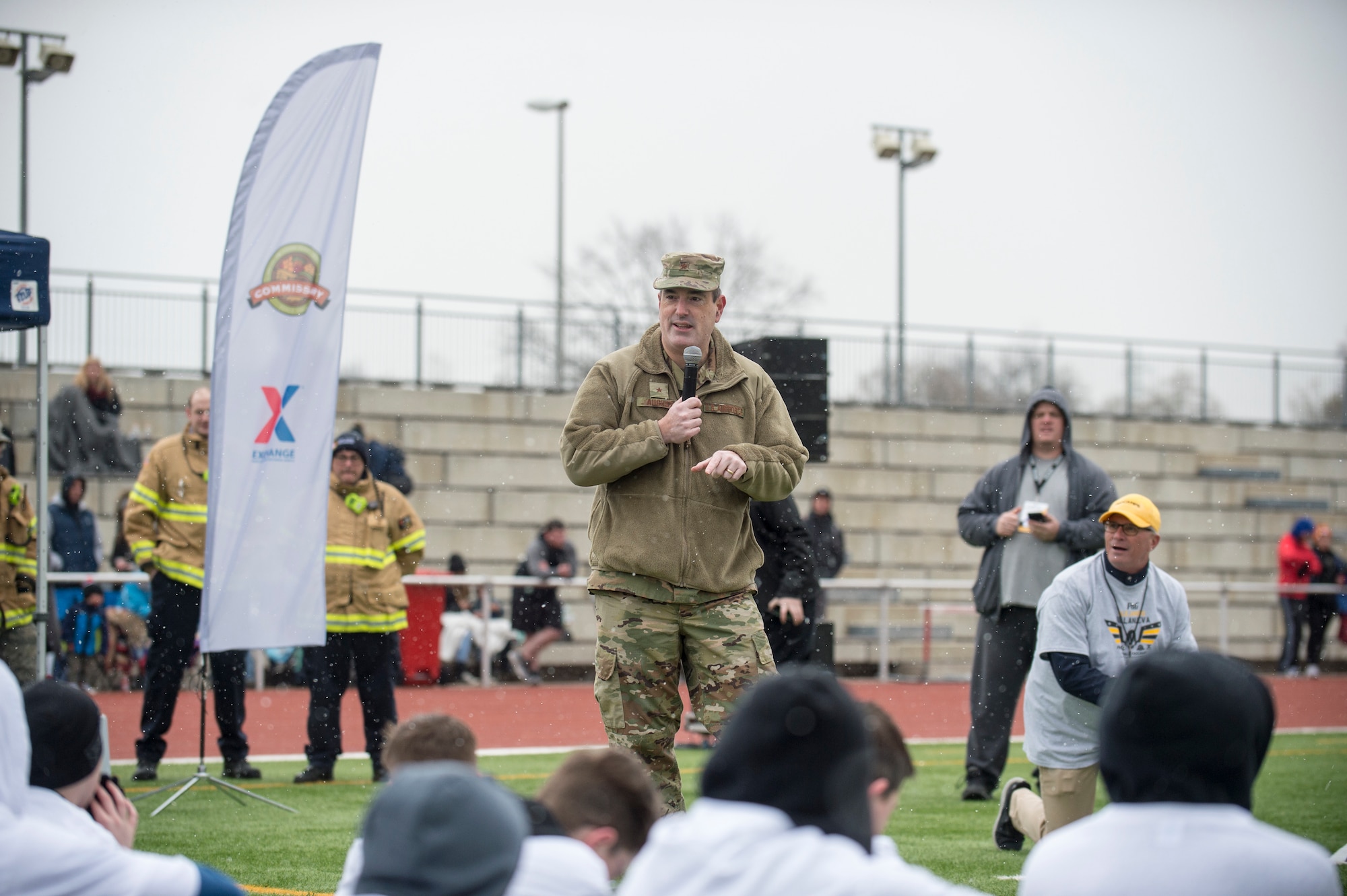 U.S. Air Force Brig. Gen. Mark R. August, 86th Airlift Wing commander, speaks to the Alejandro Villanueva football camp attendees before the camp begins at Kaiserslautern High School on Vogelweh Military Complex, April 13, 2019. August thanked Villanueva, Pittsburgh Steelers offensive lineman, and former U.S. Army captain and Army Ranger, for traveling to Europe to coach Kaiserslautern Military Community youth and adults. (U.S. Air Force photo by Staff Sgt. Jonathan Bass)