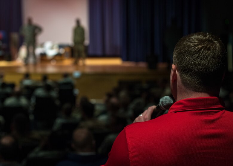 A member of the audience asks the Sexual Assault Theater Group cast some questions after a performance at Joint Base Langley-Eustis, Virgina, April 12, 2019.