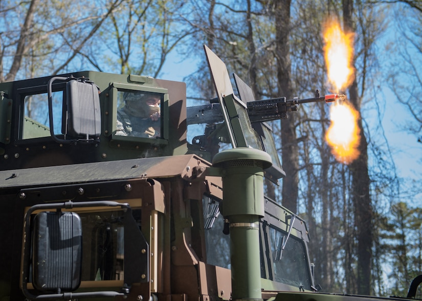 A U.S. Air Force Airman assigned to the 633rd Security Forces Squadron fires blank rounds from an M240 machine gun during a field training exercise at Joint Base Langley-Eustis, Virginia, April 11, 2019.