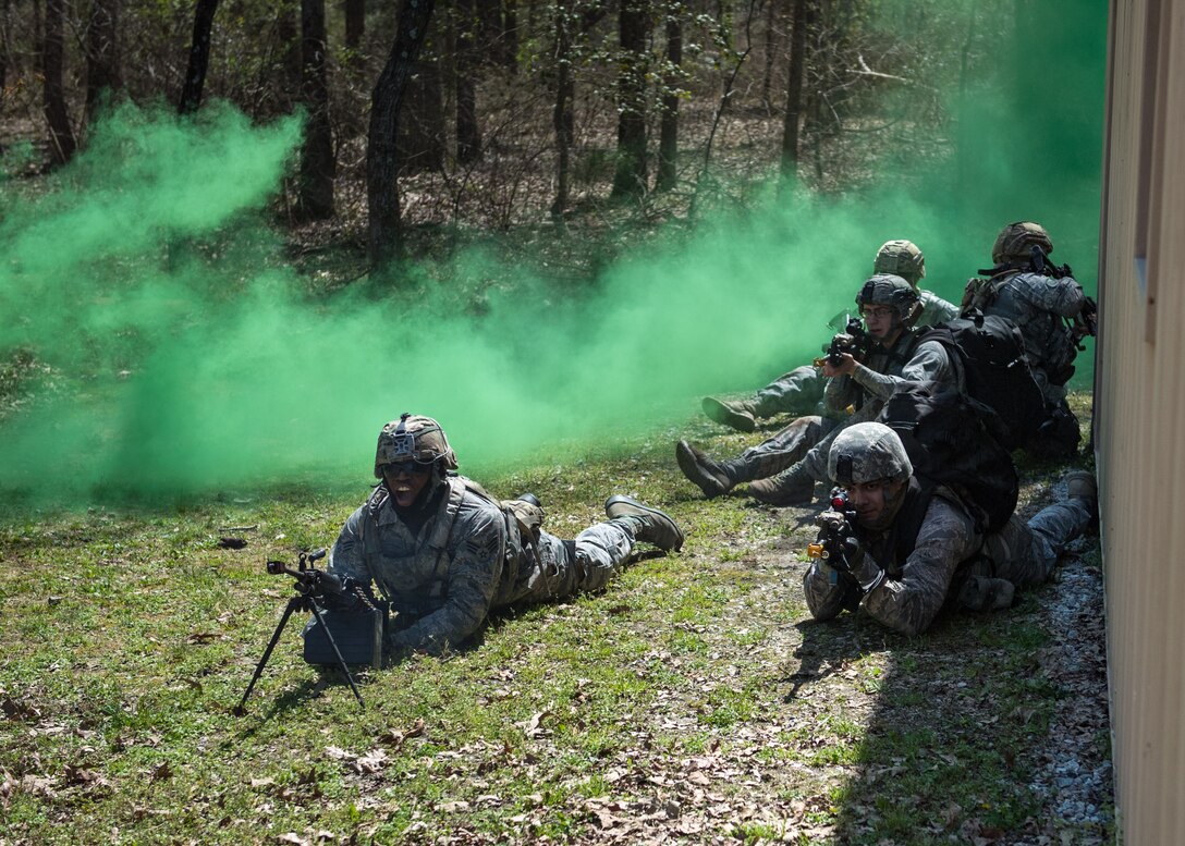 U.S. Air Force Airmen assigned to the 633rd Security Forces Squadron raid a container village during a field training exercise at Joint Base Langley-Eustis, Virginia, April 11, 2019.