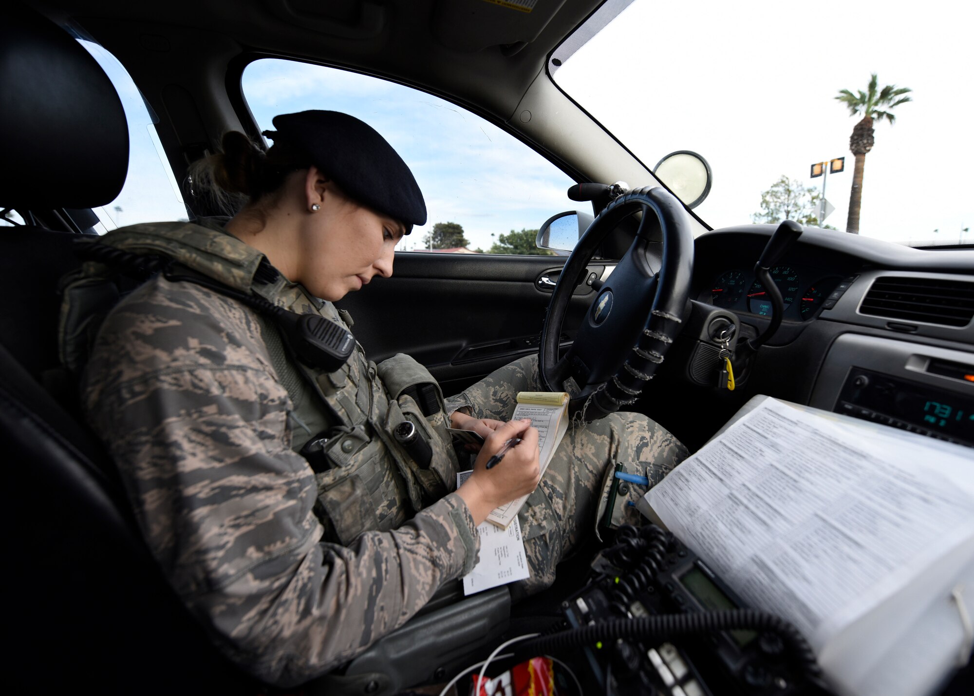 Airman 1st Class Abigail Biever, 56th Security Forces Squadron team member, writes a traffic ticket during a traffic stop April 11, 2019, at Luke Air Force Base Ariz.