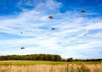 Members of the Special Operations Detachment – Europe and Co. C, 2nd Battalion, 19th Special Forces Group (Airborne), West Virginia National Guard, glide towards their landing site during static line and freefall operations Oct. 19, 2018, in Red House, Md. More than 50 Soldiers participated in multiple jump cycles throughout the day to maintain proficiency in jump operations. (National Guard photo by Bo Wriston)