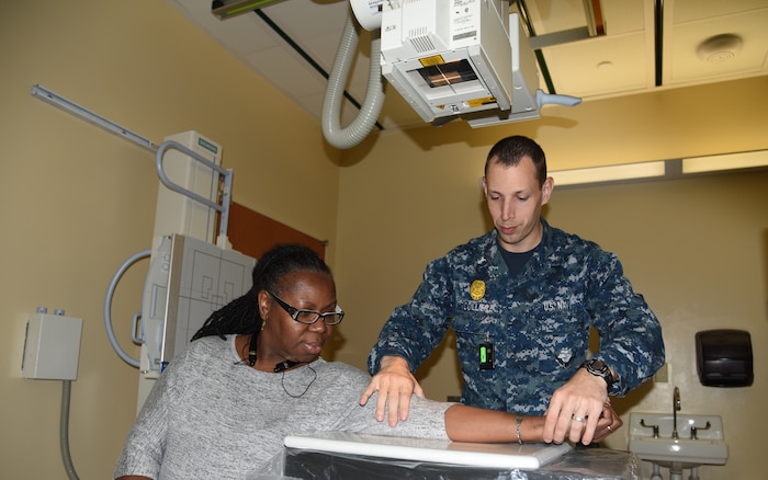 A corpsman at Naval Health Clinic Charleston x-rays the arm of a patient in this file photo. NHCC currently renders a wide range of quality health services for approximately 17,000  service members, family members and veterans at the Naval Weapons Station in Goose Creek.