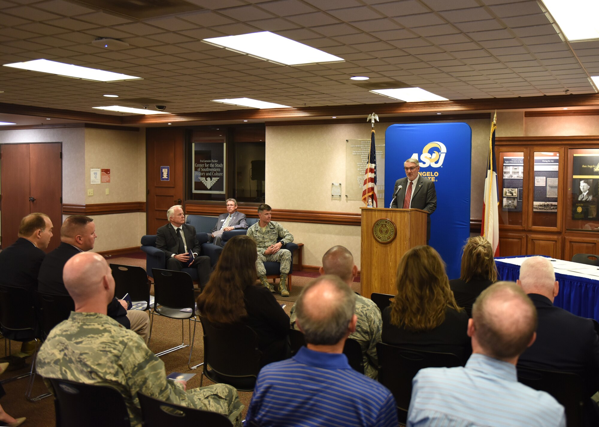 Chair Department of Security Studies and Criminal Justice Angelo State University Professor, Dr. Tony Mullins speaks to guests of the Memorandum of Understanding signing, which allows 14N professionals to transfer 12 credit hours toward two master’s degree through Angelo State University at ASU, Texas, April 15, 2019. Over 115 14N professionals have transferred credits from Goodfellow courses to one of ASU’s programs and over 60 have completed their master’s degree. (U.S. Air Force photo by Airman 1st Class Zachary Chapman/Released)