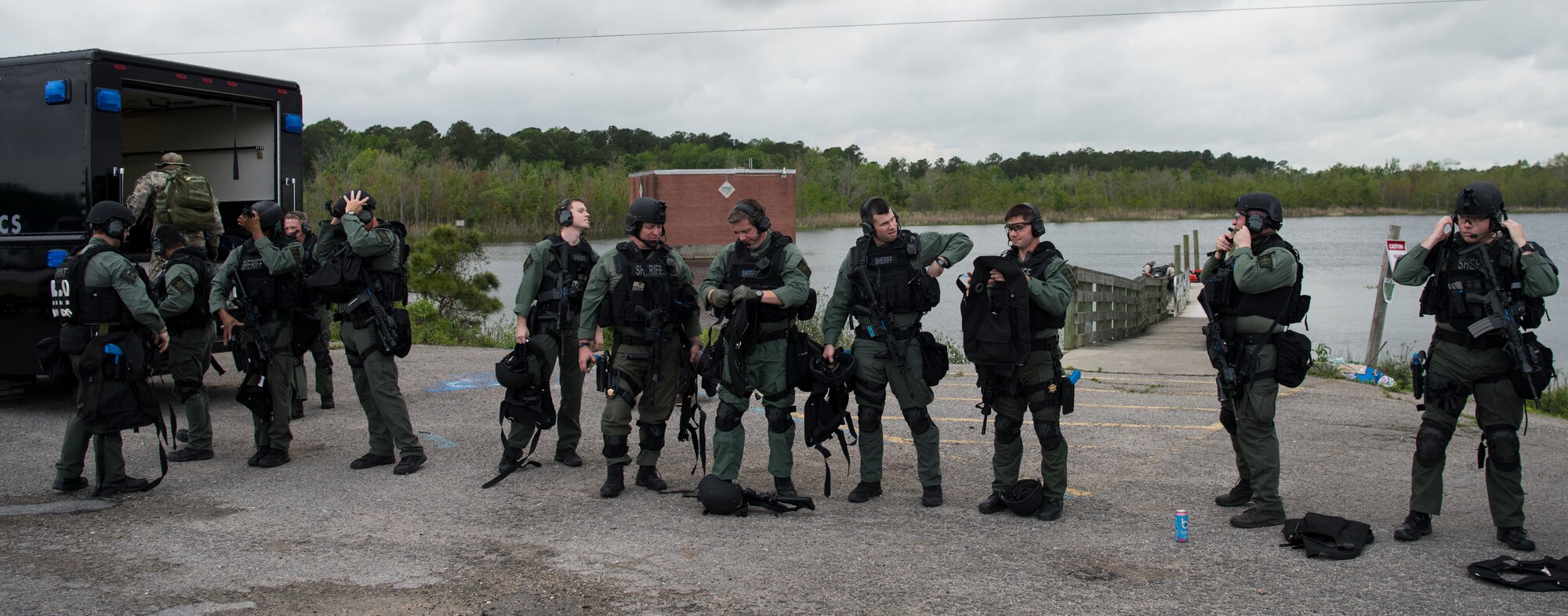The Charleston County S.W.A.T. team dons their gear for a joint training exercise with Citadel cadets and the the 628th Security Forces Squadron April 12, 2019, on Naval Weapons Station Charleston, Joint Base Charleston, S.C.