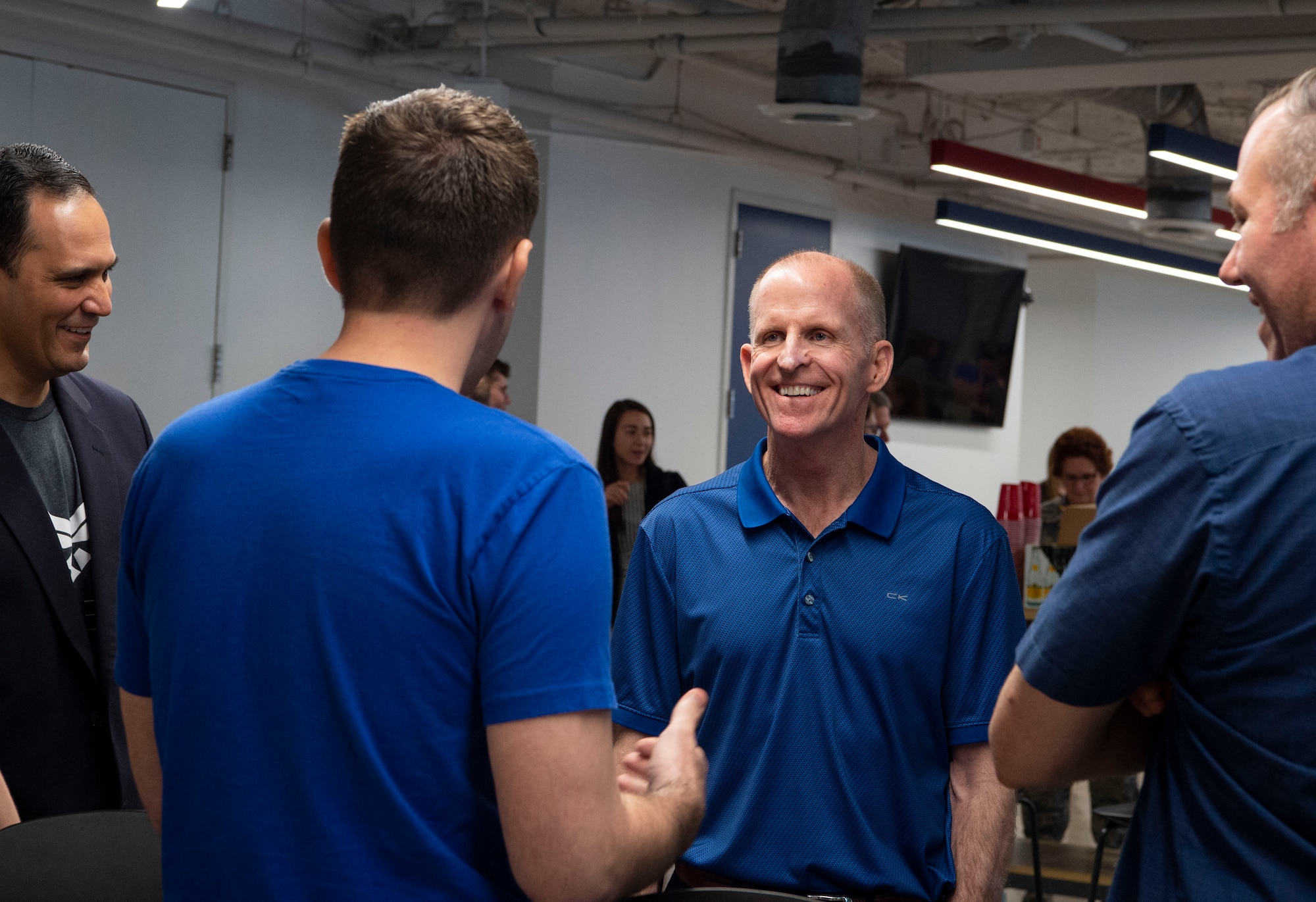 Air Force Vice Chief of Staff Gen. Stephen W. Wilson talks with Zach Walker, Defense Innovation Unit Texas lead at Capital Factory in Austin, Texas April 9, 2019.