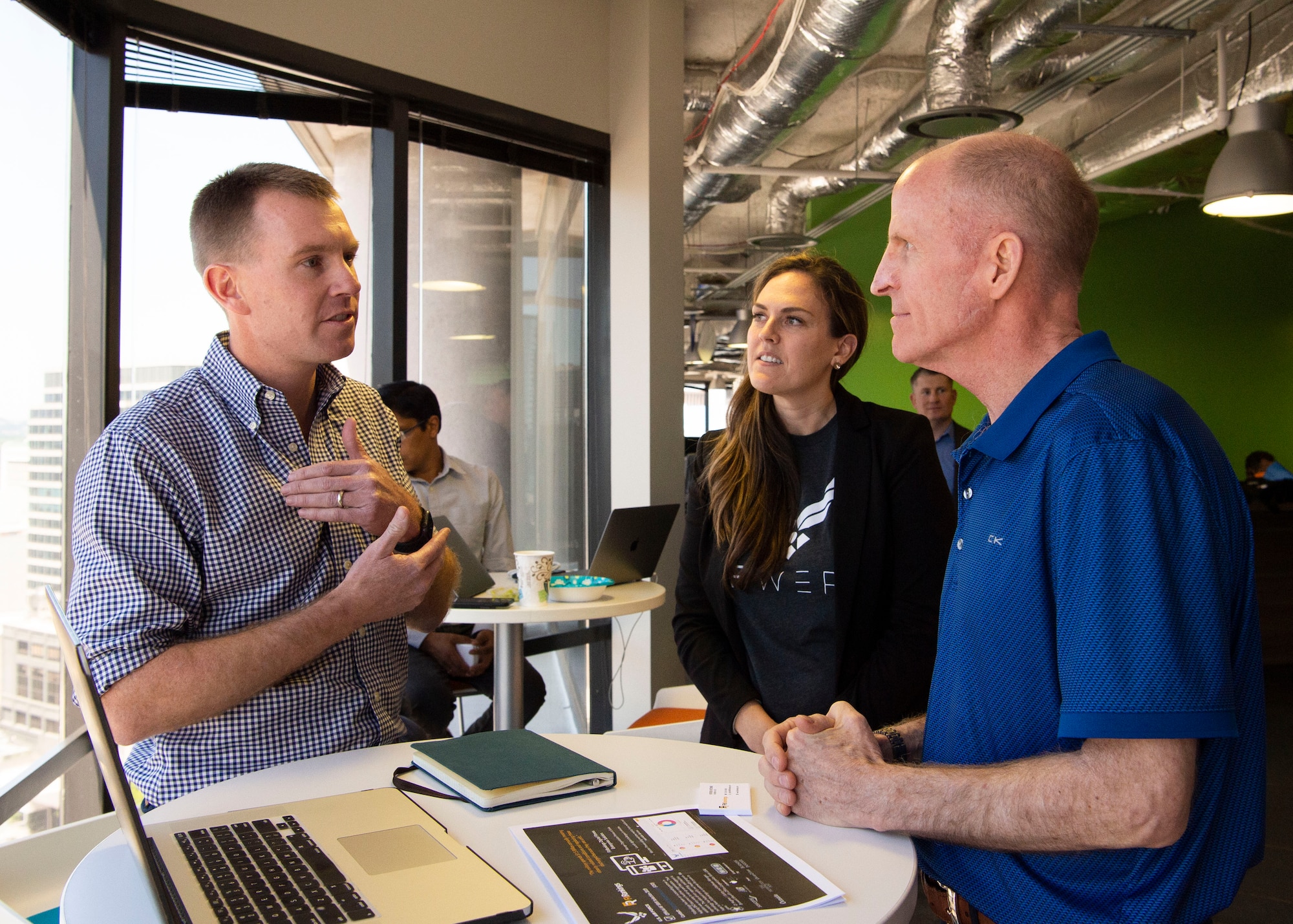 Air Force Vice Chief of Staff Gen. Stephen W. Wilson talks with Patrick Hitchens, Founder and CEO of FitRankings at Capital Factory in Austin, Texas April 9, 2019.